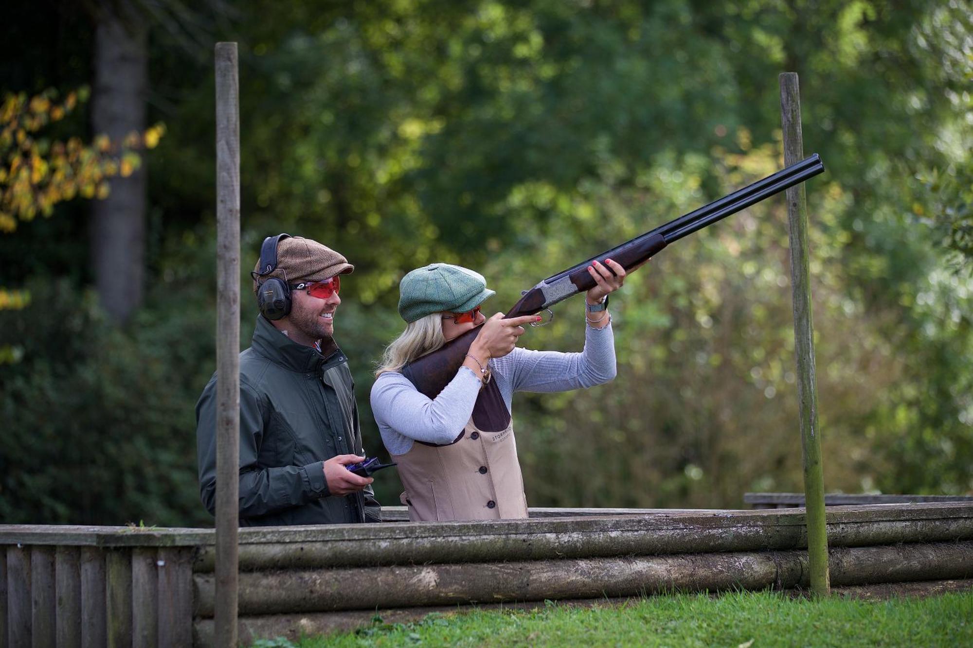 Schloss Roxburghe, Part Of Destination By Hyatt Zewnętrze zdjęcie A woman shooting with a shotgun